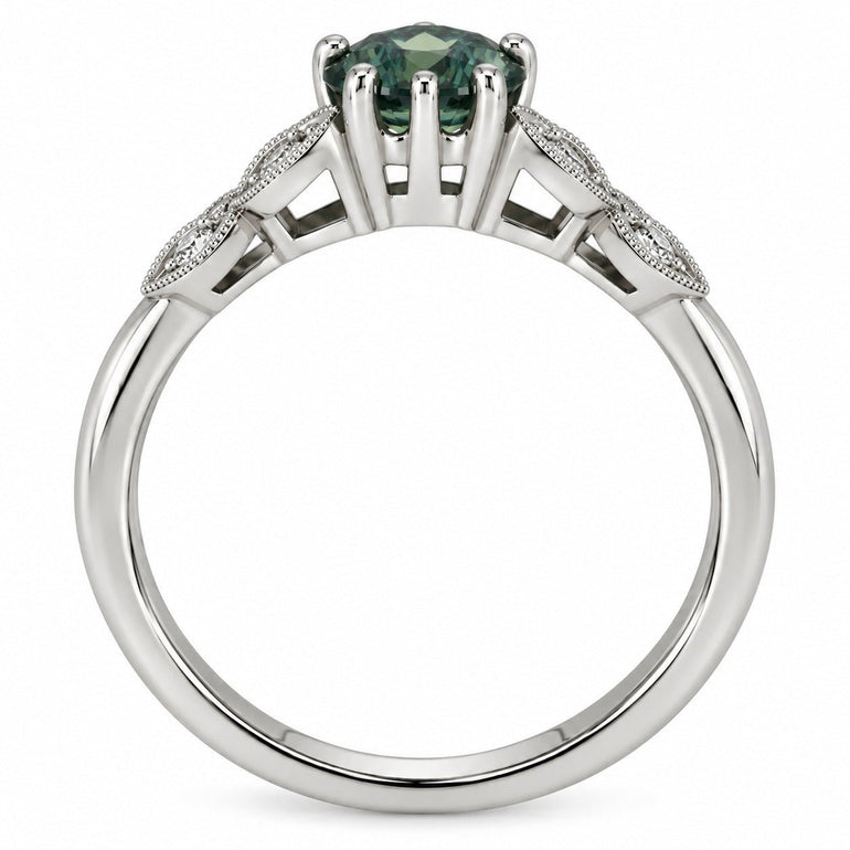 Round green sapphire and diamond engagement ring in platinum with vintage style detailing