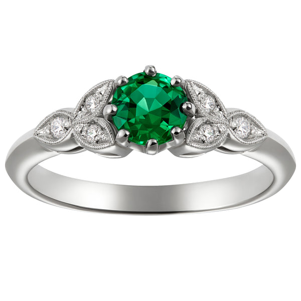 Emerald engagement ring in platinum Hatton Garden