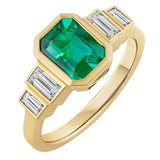 Emerald rubover ring with baguette diamonds in 18ct yellow gold. Made in the UK