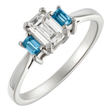 Diamond and aquamarine three stone engagement ring