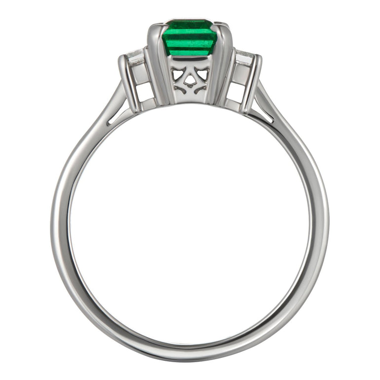 Emerald and diamond trilogy ring in platinum