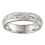 Hand engraved floral wedding band in platinum. Made in London