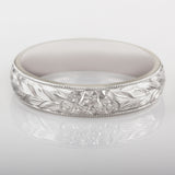 5mm engraved floral ring on perspex