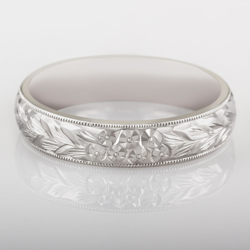 5mm engraved floral ring on perspex