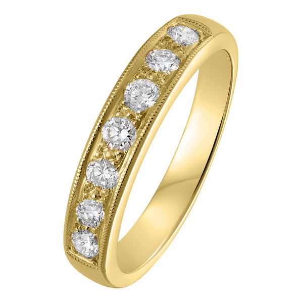 Wide band 7-stone diamond wedding ring in 18ct yellow gold