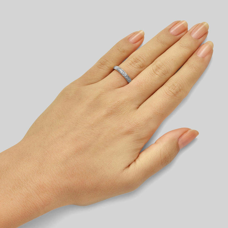 18ct white gold floral engraved wedding ring with japonica motif