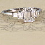 Emerald cut diamond ring with trapezoids and baguettes