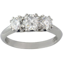 Rounded knife edge three stone ring in platinum