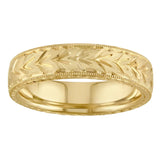 Hand engraved with floral pattern wedding ring in 18ct yellow. Made in the UK.