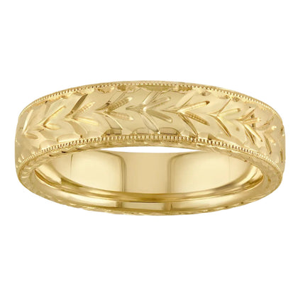 Hand engraved with floral pattern wedding ring in 18ct yellow. Made in the UK.
