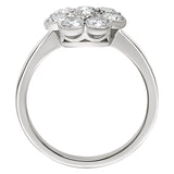 Vintage inspired cluster ring with diamonds in platinum. Made in London