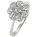 Flower diamond cluster engagement ring in platinum. Made in the UK