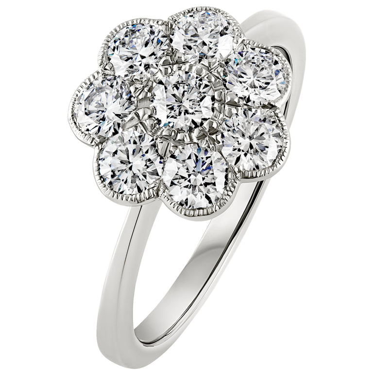 Flower diamond cluster engagement ring in platinum. Made in the UK