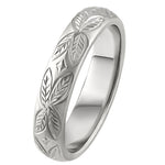 hand engraved with leaf pattern wedding band in platinum. made in london