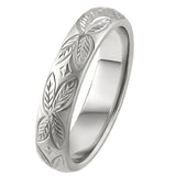 hand engraved with leaf pattern wedding band in platinum. made in london
