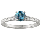 scroll hand engraved and aquamarine centre stone with sides diamond engagement ring in platinum