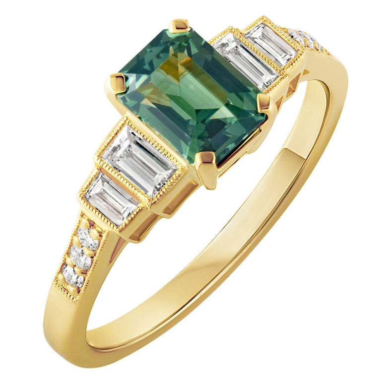 Emerald cut green sapphire with side diamonds engagement ring in 18ct yellow. Made in Hatton Garden