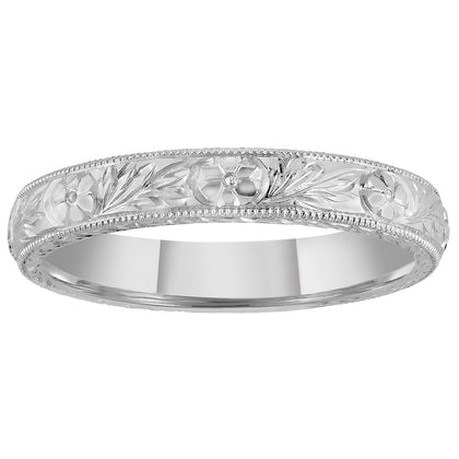 Hand engraved wedding ring in platinum with Camelia Japonica Motif and Laurel pattern. Made in London