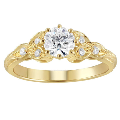 Round diamond with floral hand engraving in 18ct yellow gold made by Hatton Garden Jeweller
