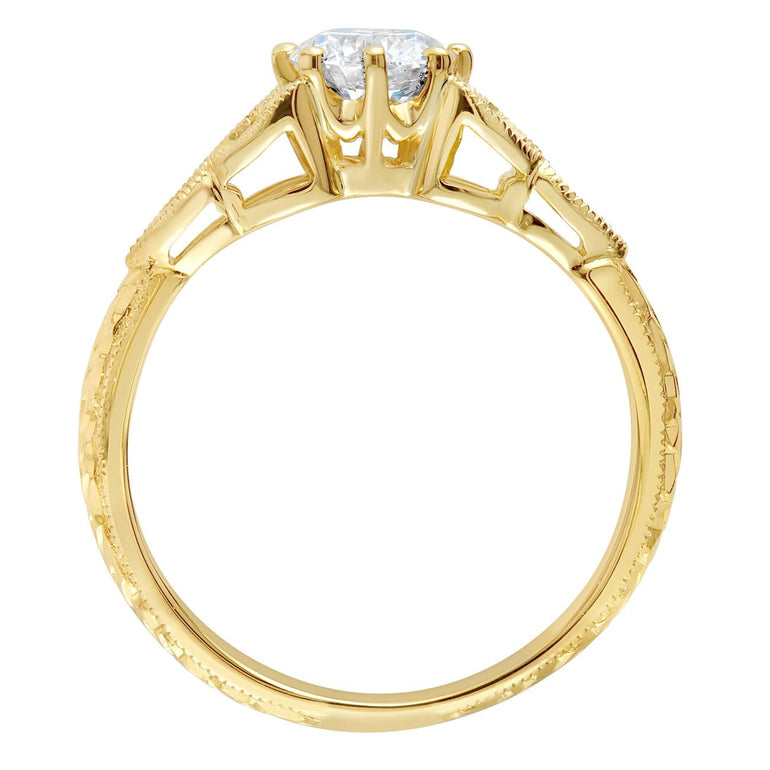 Hand engraved ring with natural diamonds and floral engraving pattern. Made in London