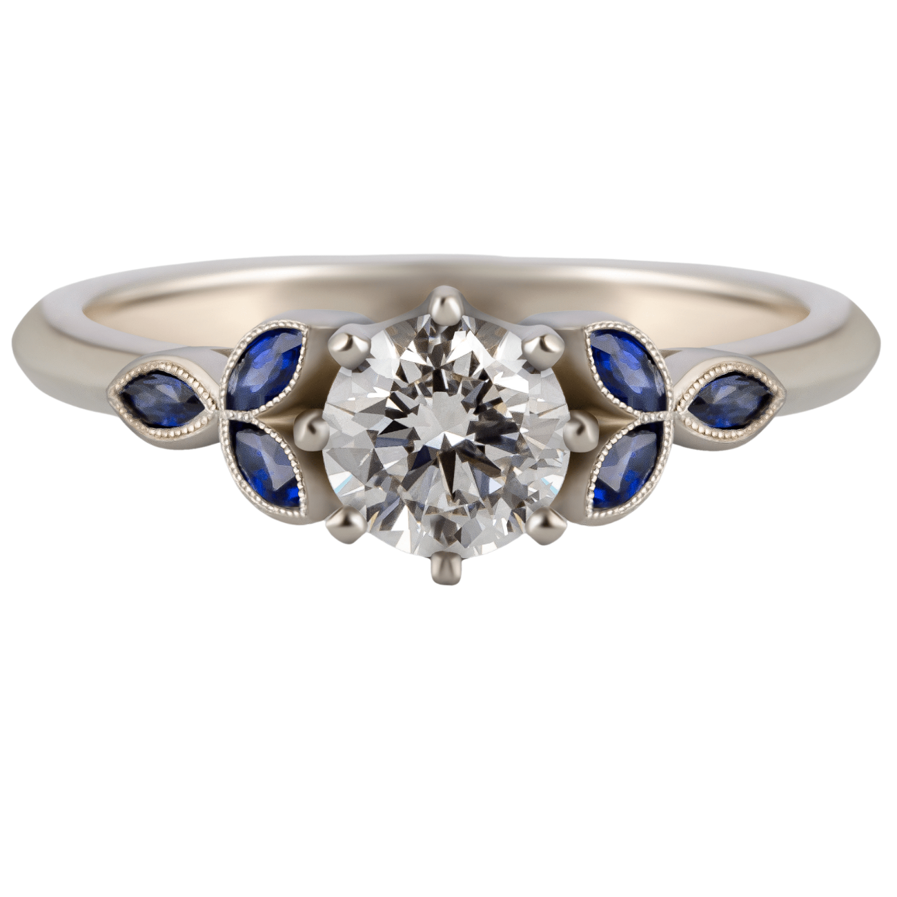 Diamond ring with blue sapphire gemstones on a white background