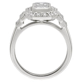 Vintage inspired emerald cut diamond halo ring with baguette diamond accents in platinum. Made in Hatton Garden