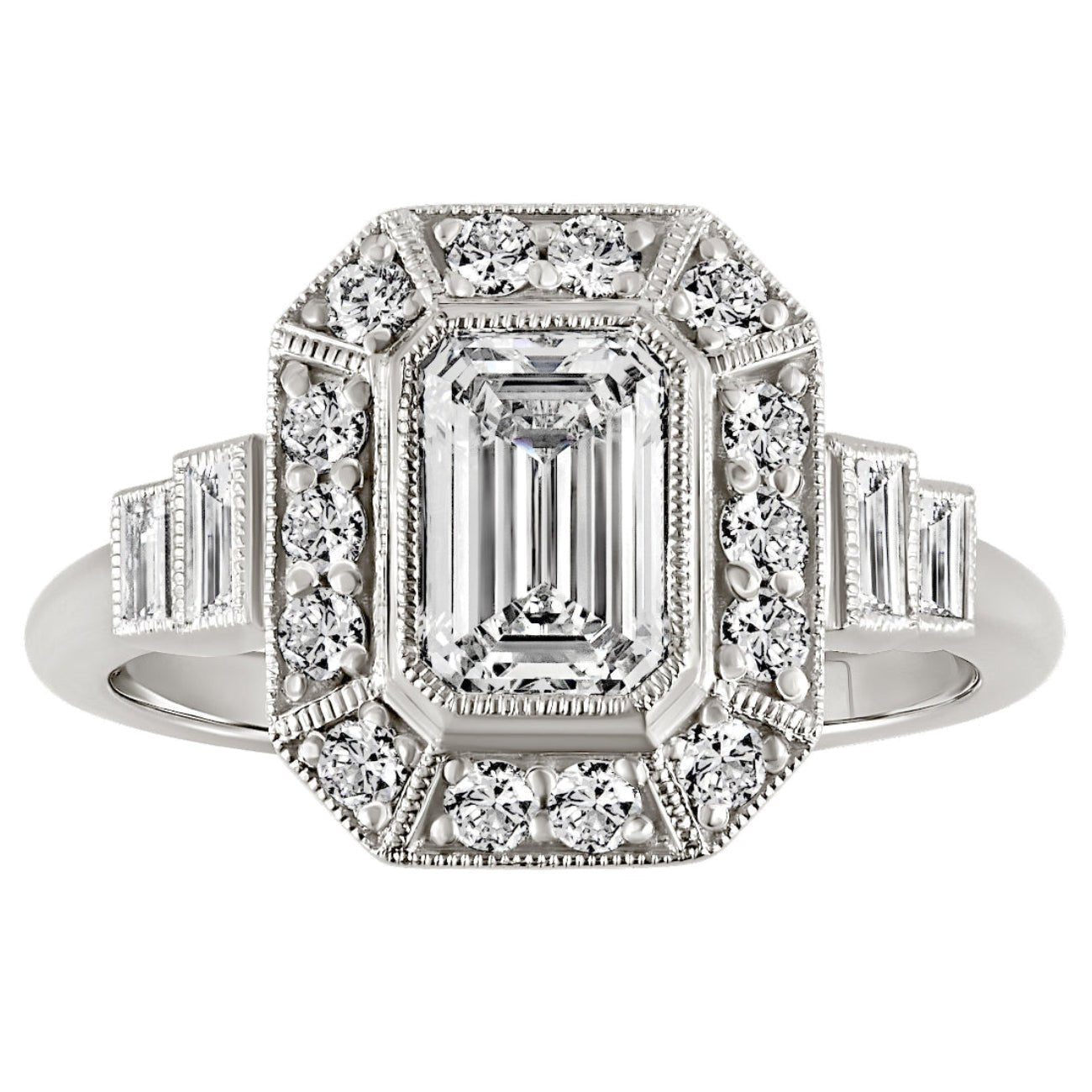 Emerald cut diamond halo engagement ring with baguette side diamonds in platinum. Made in London