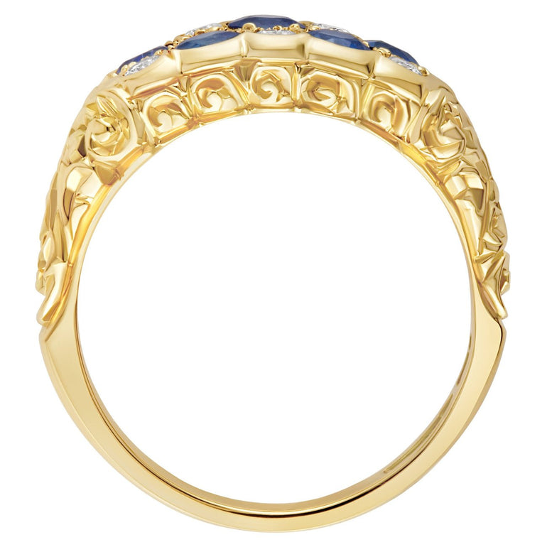 Checkerboard blue sapphire and diamond engagement ring with engraving in 18ct yellow gold. Made in London