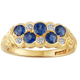 Yellow gold sapphire and diamond band with alternating round blue sapphires and diamonds and engraving. Made in the UK