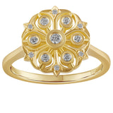 18 carat yellow gold diamond cluster engagement ring featuring a floral-inspired design with round brilliant-cut diamonds. Made in the UK.