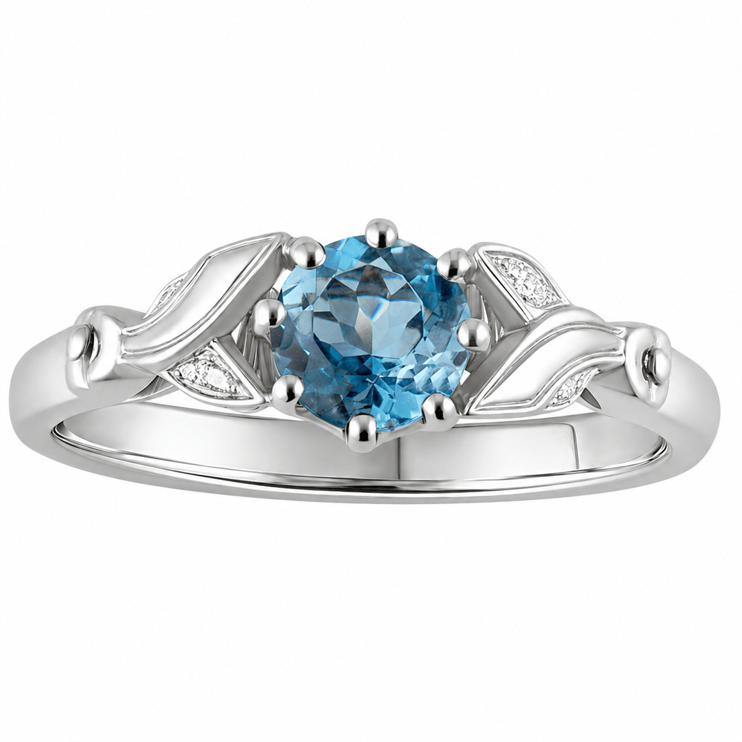 vintage style aquamarine engagement ring with flower shoulders. Made in the UK
