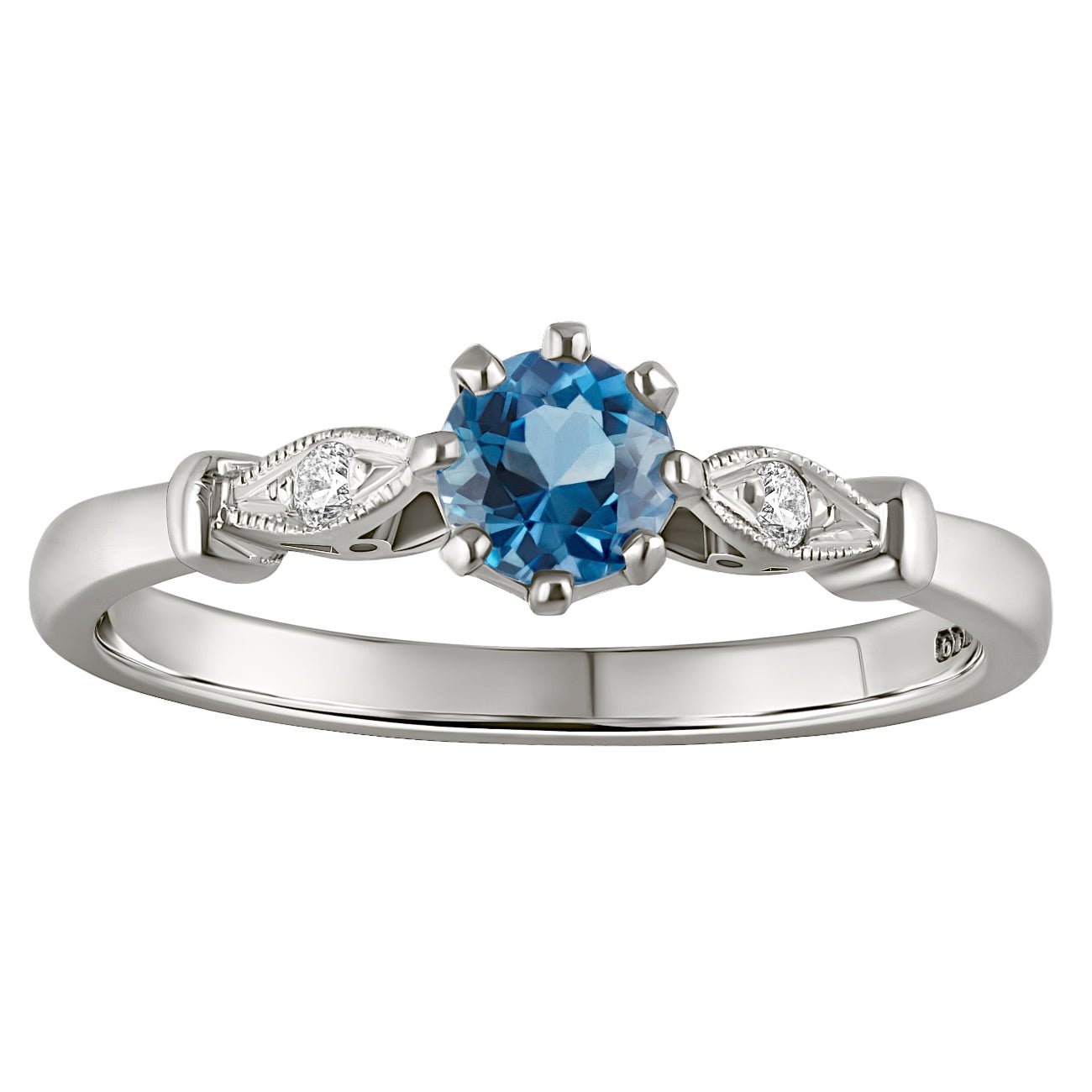 vintage style aquamarine with diamond shoulders in platinum. Made in the UK