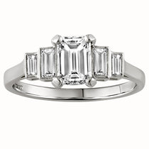 Emerald cut diamond engagement ring with baguette side stones in a stepped design, crafted in white metal, made in London, UK 
