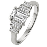 Five stone diamond ring featuring a central emerald cut with tapered baguette diamonds, made in London Hatton Garden