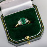 Emerald and diamond 3 stone ring in gold and platinum