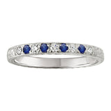 Blue Sapphire and diamond with laurel engraving wedding ring in platinum. Made in London