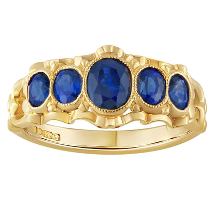 One-of-a-kind 18ct yellow gold ring set with five blue sapphires in a classic five-stone design. Made in the UK