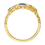 18ct yellow gold ring set with five blue sapphires in a classic five-stone design. Made in the London