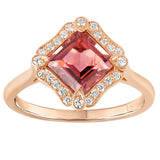 Art Deco style pink tourmaline and diamond cluster ring in rose gold with a square-cut tourmaline centre and diamond halo. Made in London.
