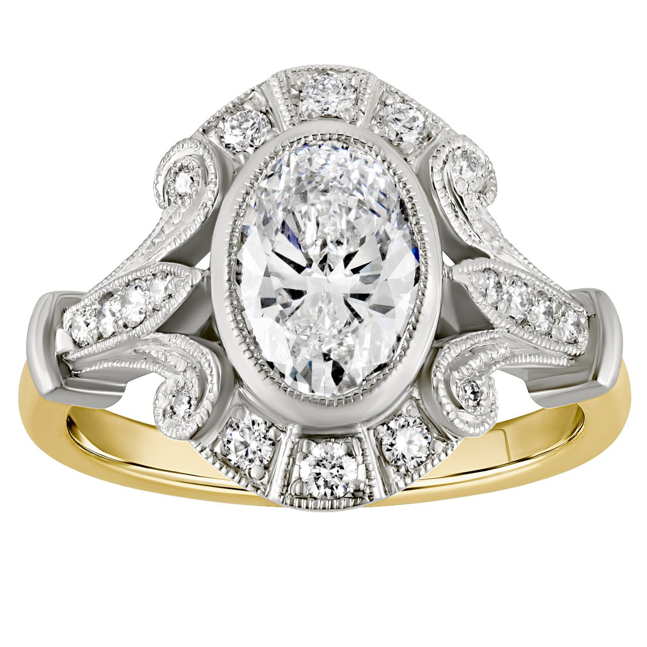 Oval lab grown diamond cluster ring in platinum and 18 carat yellow gold with natural diamond halo. Made in London