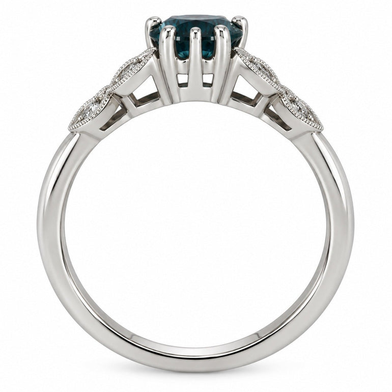 Montana Teal sapphire ring with floral diamond leaves in platinum