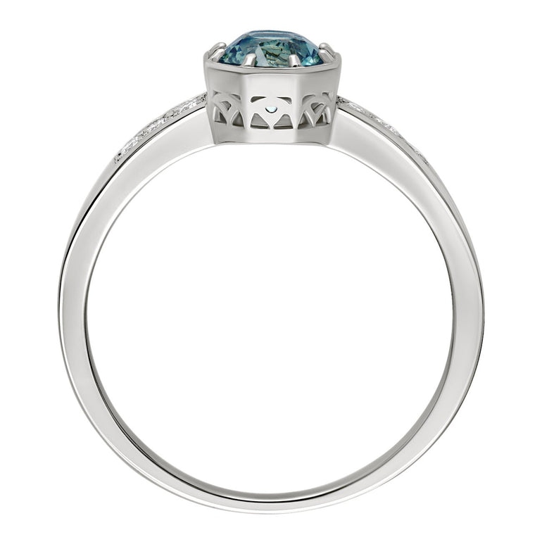 Single stone teal sapphire with diamonds engagement ring made in the UK. 