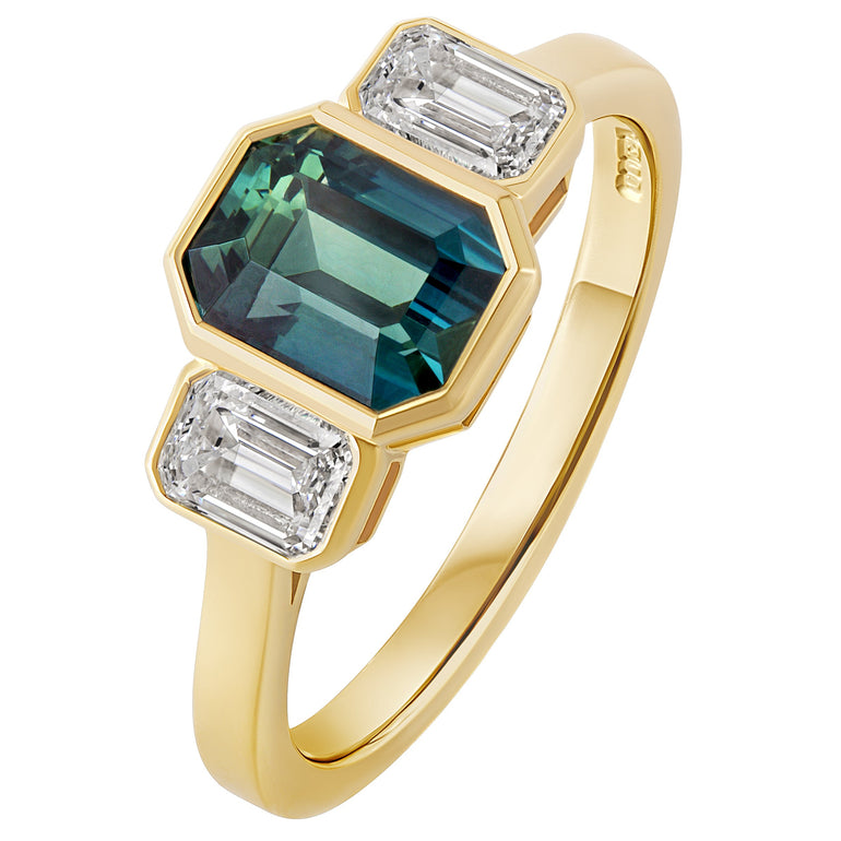 Teal Sapphire with side diamonds made in Hatton Garden, London.