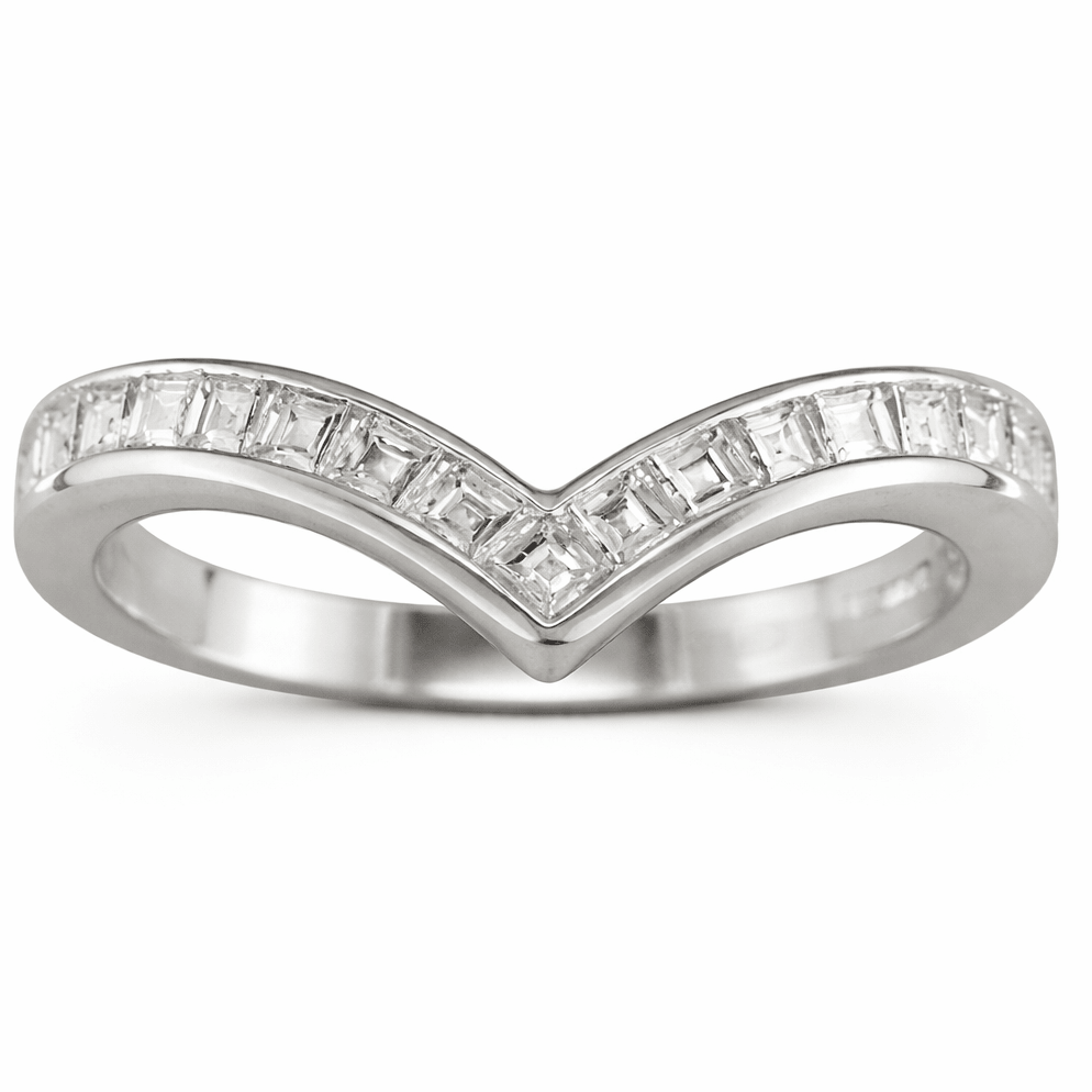carre cut diamonds on a curved wedding band in platinum. Made in London