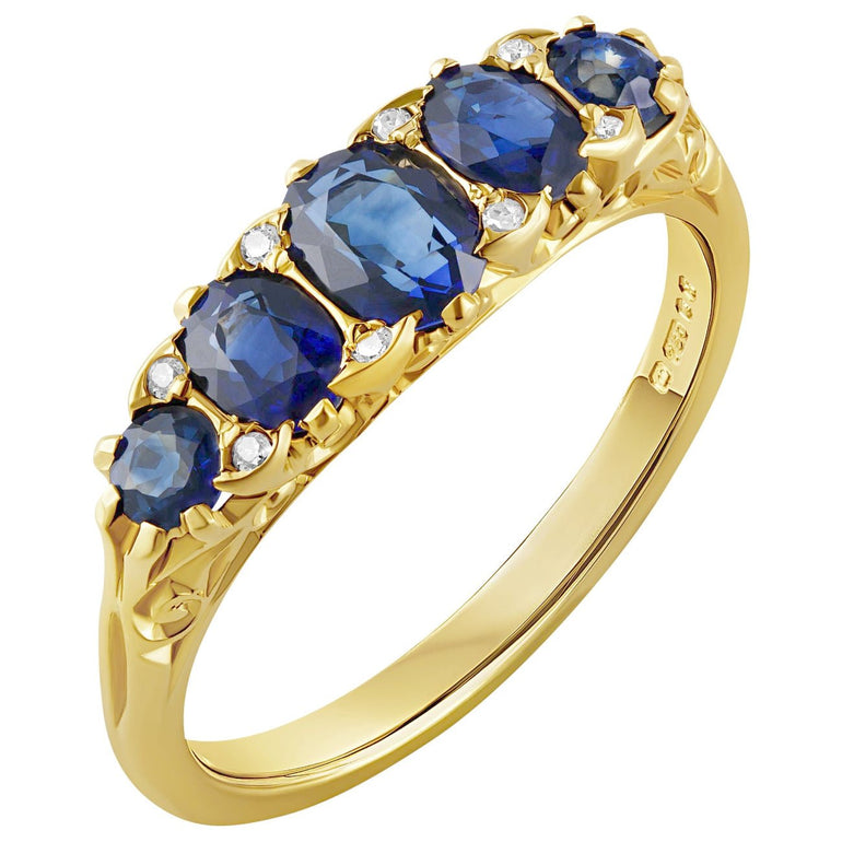 Victorian-style 18ct yellow gold half hoop ring set with five blue sapphires and small diamond accents. Made in the UK