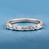 Baguette and round diamond half eternity ring in platinum