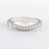 Bespoke curved diamond wedding band in white gold
