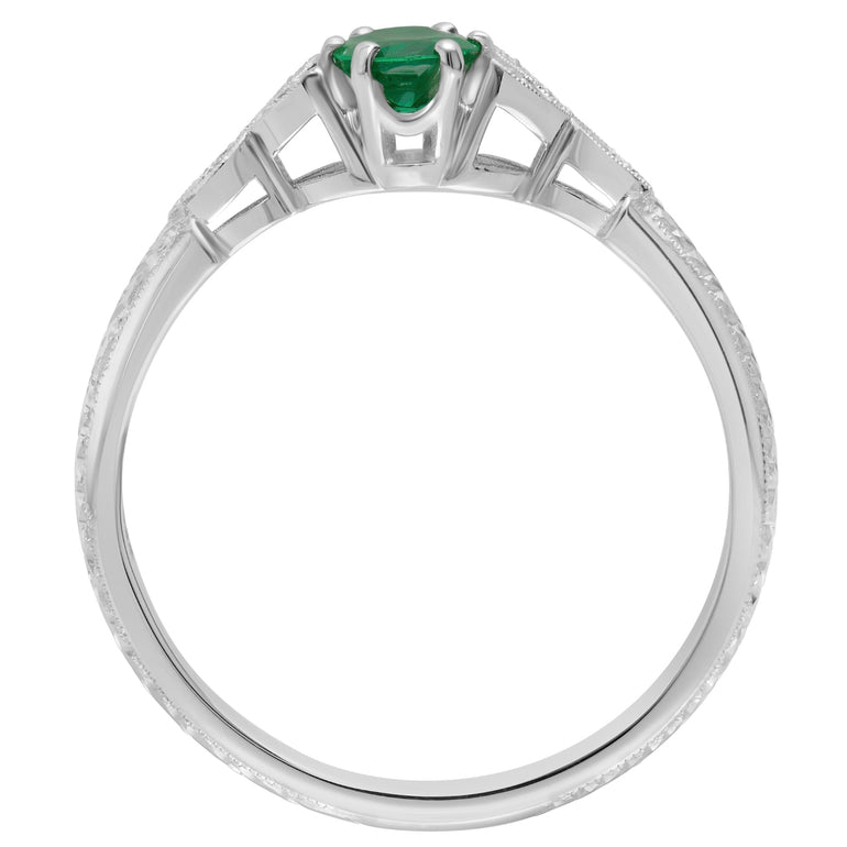 bespoke oval emerald gemstone and engraved floral pattern handcrafted in the UK