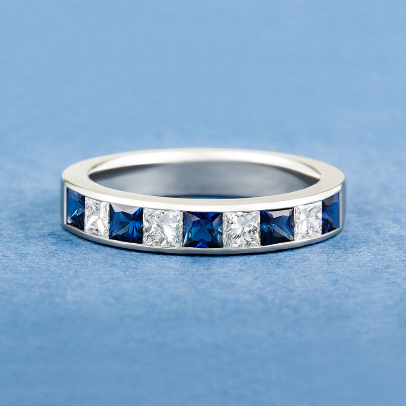 Blue sapphire and diamond half eternity band