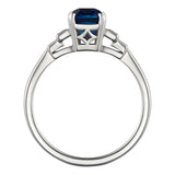 Blue sapphire engagement ring with 10 diamonds in platinum